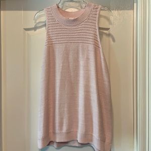 Sleeveless mock neck sweater